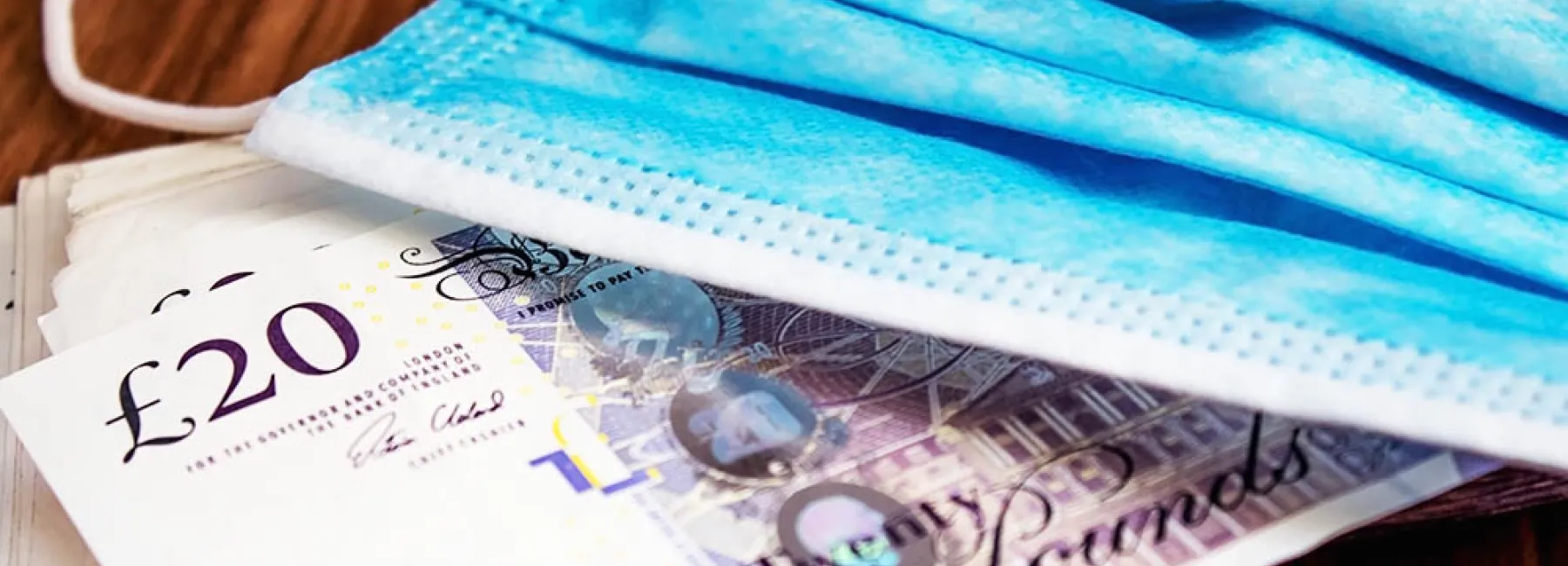 COVID mask and cash