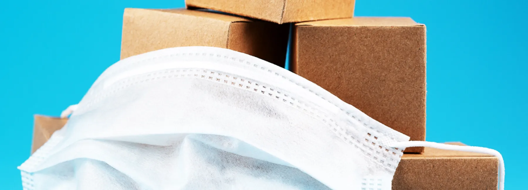 COVID mask and boxes