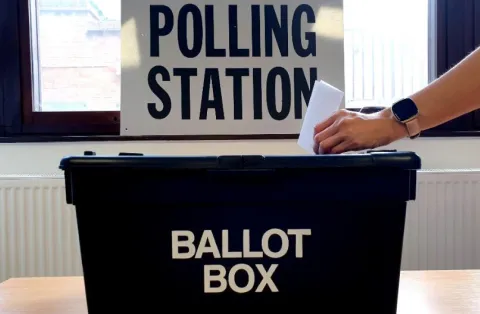 a ballot box in a polling station
