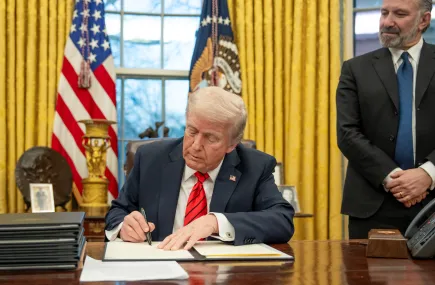 Donald Trump singing Executive Orders in the Oval Office
