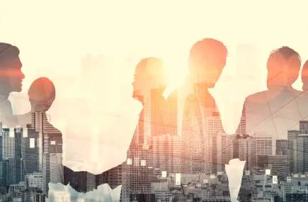People in front of London skyline
