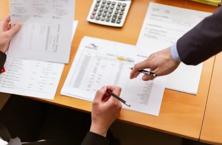 People checking paperwork
