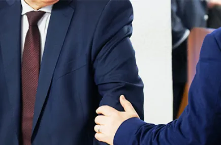 Two people in suits