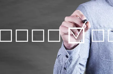 Man ticking a box