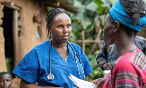 Healthcare workers treat patients